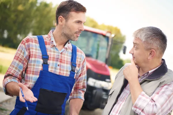 Farmers chat tractor talk convo